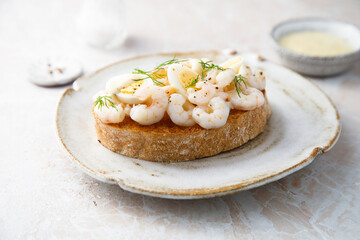 Wall Mural - Traditional Scandinavian shrimp sandwich with egg and dill