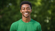 Closeup Portrait of a smiling african american and white guy against a green studio background
