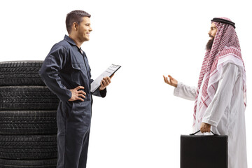 Sticker - Profile shot of an auto mechanic and a male arab customer talking