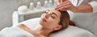 © Igor Tichonow - Woman Receiving a Relaxing Spa Facial Treatment. A tranquil scene of a woman lying down, receiving a soothing facial massage in a serene spa setting with soft lighting