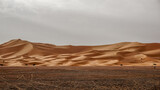 Fototapeta  - Panorama of the famous and legendary dunes of Erg Chebbi in the Sahara Desert, Morocco.