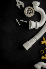 Poster - Plumber work with instruments, tools and gear on black background top view mock up