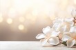 Elegant white gardenia with magical bokeh background and copy space for text on the left side