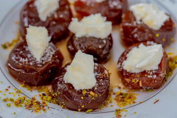 Sticker - Traditional stuffed dried fig dessert with walnuts and cream, cooked with syrup (Turkish name: fig dessert with cream).​