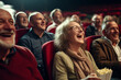 people of different looking, genders and ages in cinema laughing while watching comedic interest movie