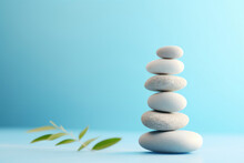 Stack Of Zen Stones On Light Blue Background. Zen Concept.