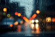 Regentropfen auf einer Windschutzscheibe bei Nacht. Lichter spiegeln sich in den Regentropfen.
