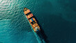 © Shafay - Top view of a cargo ship sailing in the water, loaded with containers, concept of international shipping and transportation