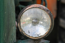 Cracked Main Headlight On An Old Tractor