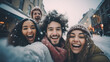 Smiling portrait of young group of student friends enjoying time together on winter. Young adult people having fun during christmas vacation outdoors