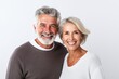 © AIPERA - Beautiful smiling senior family couple enjoying healthy living after retirement in the white background