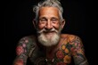 A cheerful elderly man with a white beard and a twinkle in his eyes smiles broadly, his skin adorned with vibrant colored tattoos of flowers and patterns against a black background