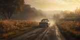 Fototapeta  - car on the road, a pickup truck driving down a country road on a hazy m