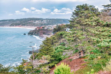 Distant view of the Golden Gate Bridge taken near Land's End Trail, San Francisco, California, USA