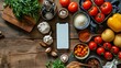 a smartphone surrounded by a variety of fresh ingredients and spices on a wooden surface, suggesting meal preparation with the aid of a digital recipe. Concept of an aesthetically pleasing arrangement