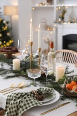 Wall Mural - Christmas table setting with festive decor and dishware in room