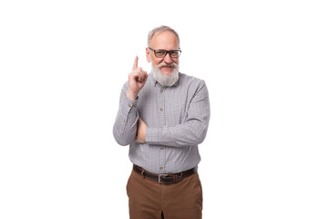 Wall Mural - elderly smart boss man with a white beard and mustache works in a business company