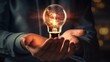 A businessman holding light bulb for smart innovation business concept
