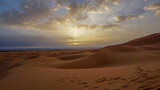 Fototapeta  - 01_Sunrise of the famous and legendary dunes of Erg Chebbi in the Sahara Desert, Morocco.