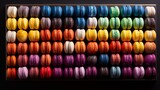 Fototapeta Tęcza - A visually stunning composition of colorful macarons arranged in a gradient pattern, exuding elegance and precision.