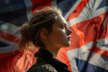 Portrait Of A Pretty Young British Woman In Front Of The UK Flag.