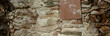 Close up old gray brick texture wall concept photo. Medieval architecture, backyard with palm trees