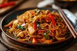 Wok Perfection: Stir-Fried Noodles in Chow Mein with Vegetables and Chicken - A Culinary Masterpiece, Bursting with Authentic Asian Flavors and the Crunchy Texture of Fresh Ingredients.


