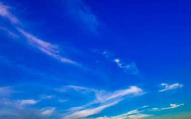 Wall Mural - Blue sky with chemical chemtrails cumulus clouds scalar waves sky.