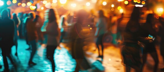 Wall Mural - Disco with people enjoying themselves, artistic blur effect.