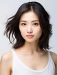 © Ahmad  - Portrait of white and clean young Japanese female beauty model, graceful posing, studio photo, isolated white background, AI Generative