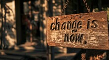 A Close-up Of A Weathered Protest Sign With The Words "change Is Now," Reflecting The Persistent Call For Societal Transformation.