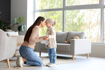 Canvas Print - Little girl after chemotherapy with her mother holding hands at home