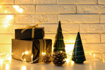 Poster - Gifts with Christmas decor and garland on dresser near white brick wall