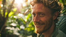 Cinematic Closeup Portrait Of A Young Nordic Man, Looking Into Camera With Happy Smiling Face , In A Jungle Like Garden Filled With Exotic Plants In Vibrant Colours