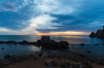 view of clear water by the sea in the evening sunset, bright weather, cool relaxing.