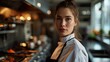 © ND STOCK - Female Chef contemporary kitchen adorned with sleek appliances and a minimalist design, a smart and skilled female chef stands confidently amidst the culinary tools of her trade