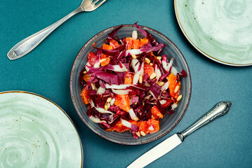 Canvas Print - Salad with orange and red organic radicchio.