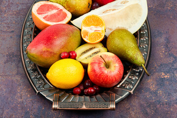 Canvas Print - Assortment of fruits on a vintage tray.