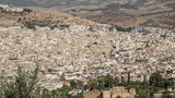 Fototapeta  - The old district of Medina, a UNESCO monument with over 9,000 labyrinth streets in Fez, Morocco.