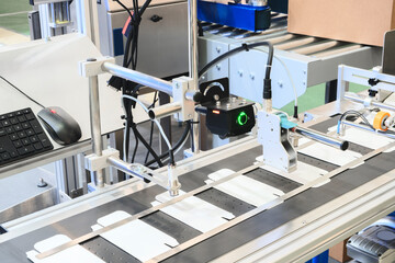 Poster - Automatic packaging conveyor line in pharmaceutical factory, pharmaceutical industrial concept background