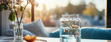 Wide Panoramic Facebook Banner Photo Of A Flower Vas And A Clear Glass Of Water Near A Window With Beautiful Flower Bunch And Blurred Background On A Cozy Hotel Bedroom Table    