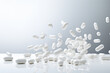 Falling white Pills on blurred white  background for Pharmacist day , a heathy, sick,