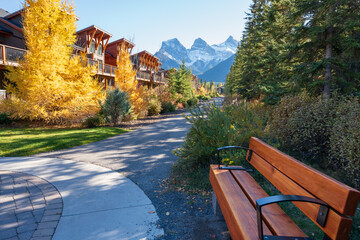 Wall Mural - Walking trail in residential area. Town of Canmore street view in fall season. Alberta, Canada.