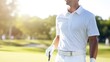© Bilal - Golfer on a golf course. Golfer in a white shirt holding a golf club