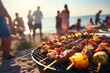 Barbecue party with people in the background, grilled skewers, brochettes, grilled meat and vegetables, at the beach, summer party, barbecue at the sea, people having fun, family and friends, bbq: