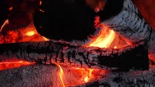 Stone Fireplace With Burning Logs And Smoke