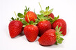 Ripe, scarlet and flavorful strawberries isolated on a snowy background.