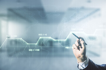 Poster - Man hand with pen working with abstract virtual analytics data spreadsheet on blurred office background, analytics and analysis concept. Multiexposure