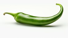 A Green Pepper On A White Background