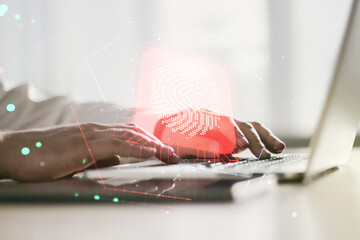 Aufkleber - Double exposure of abstract creative fingerprint hologram with hands typing on laptop on background, research and development concept